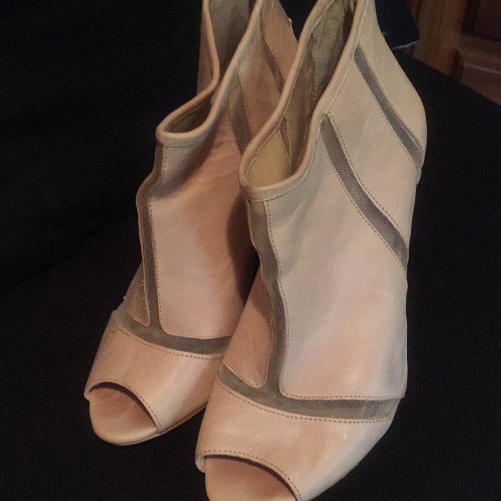 Soft pink booties with peep hole toe